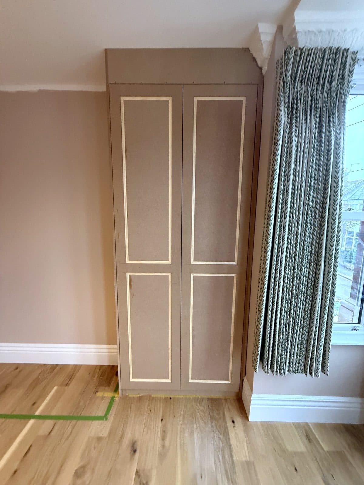 Right wardrobe beside the bay window