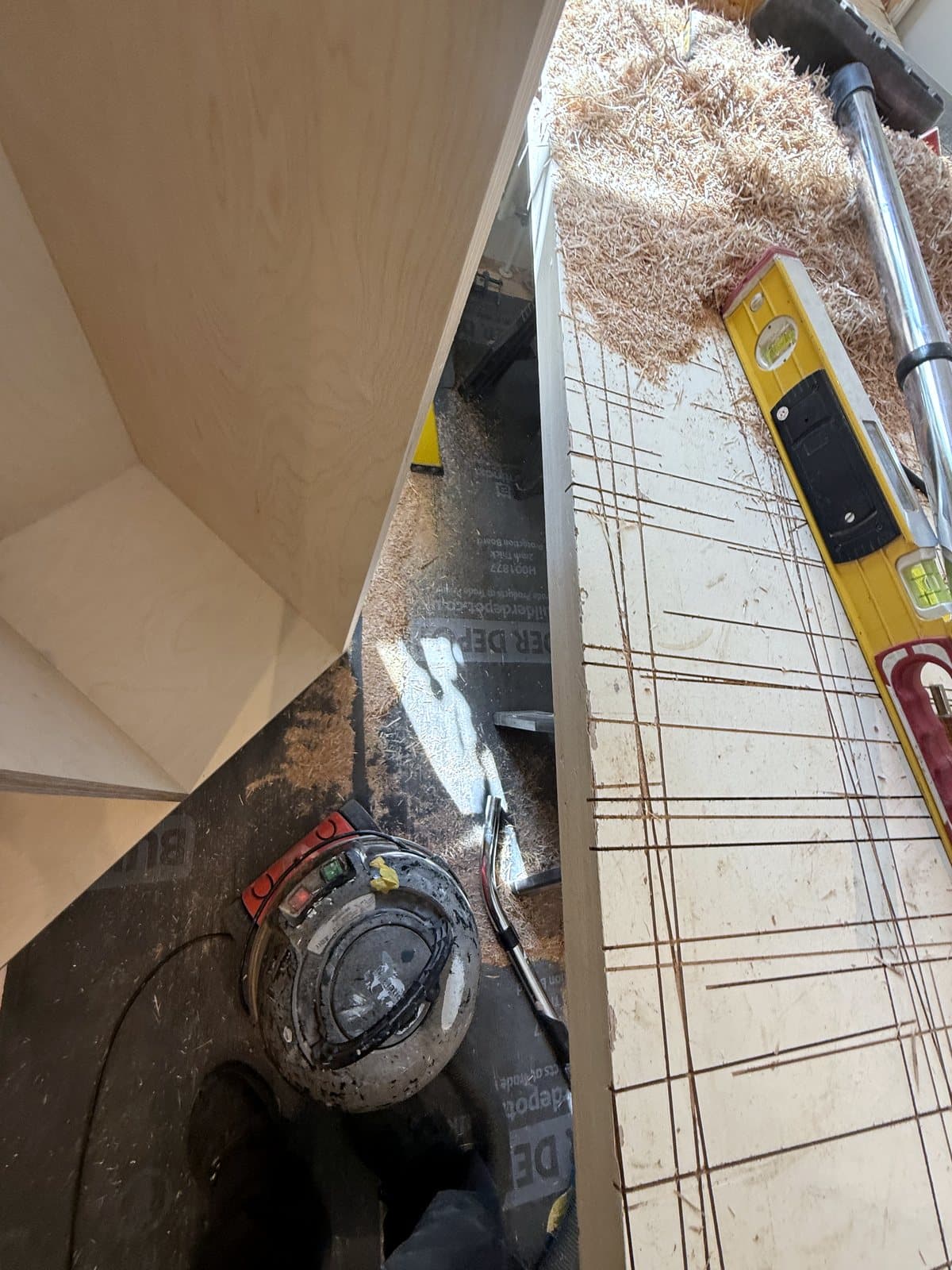 Birch ply on the bench, marked out for cutting