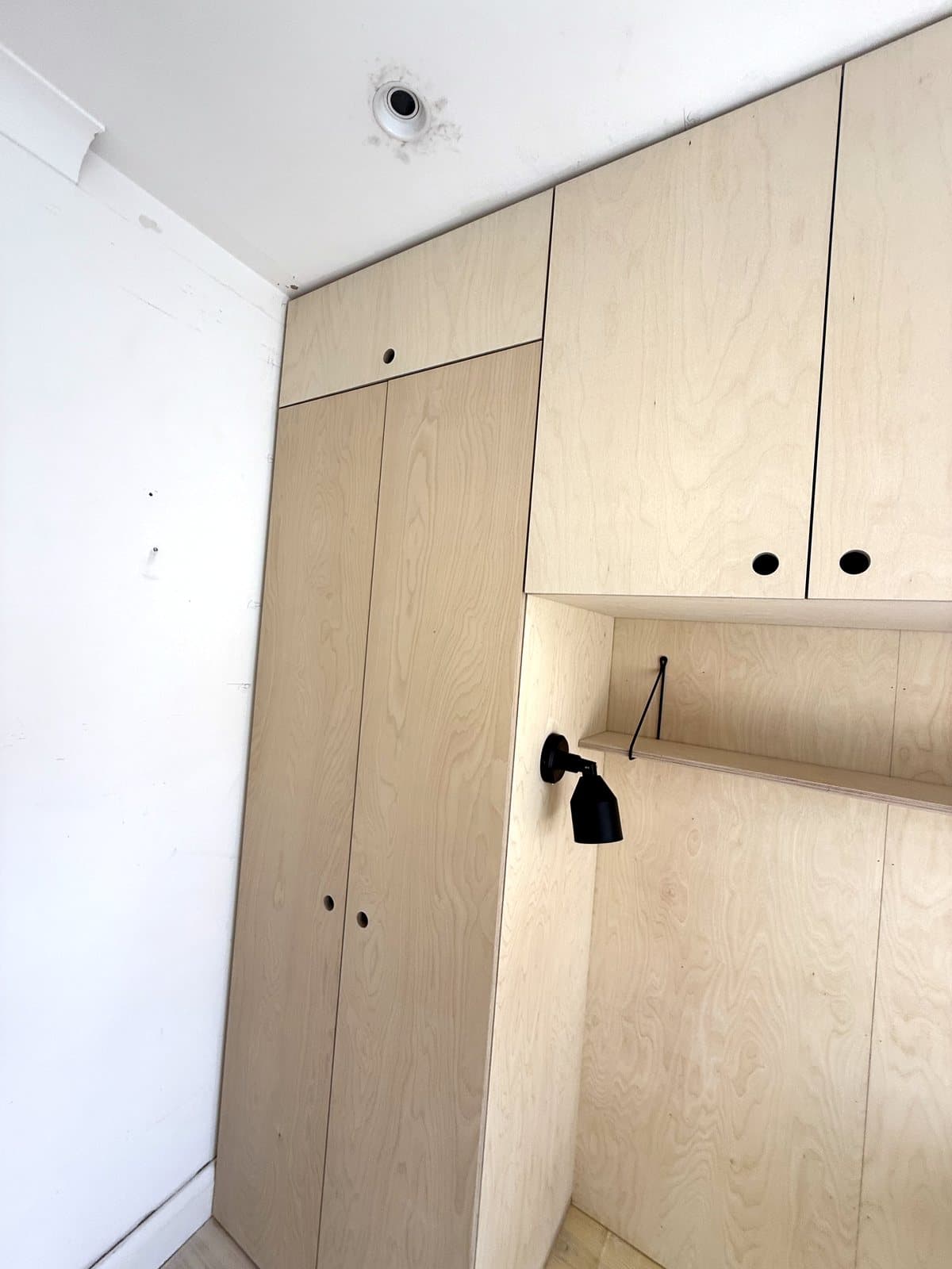 Tall wardrobe beside the desk