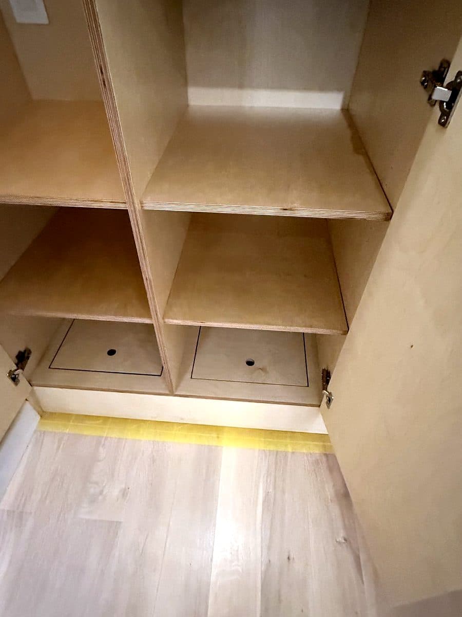 Floor panels with finger holes at the bottom of the left bays