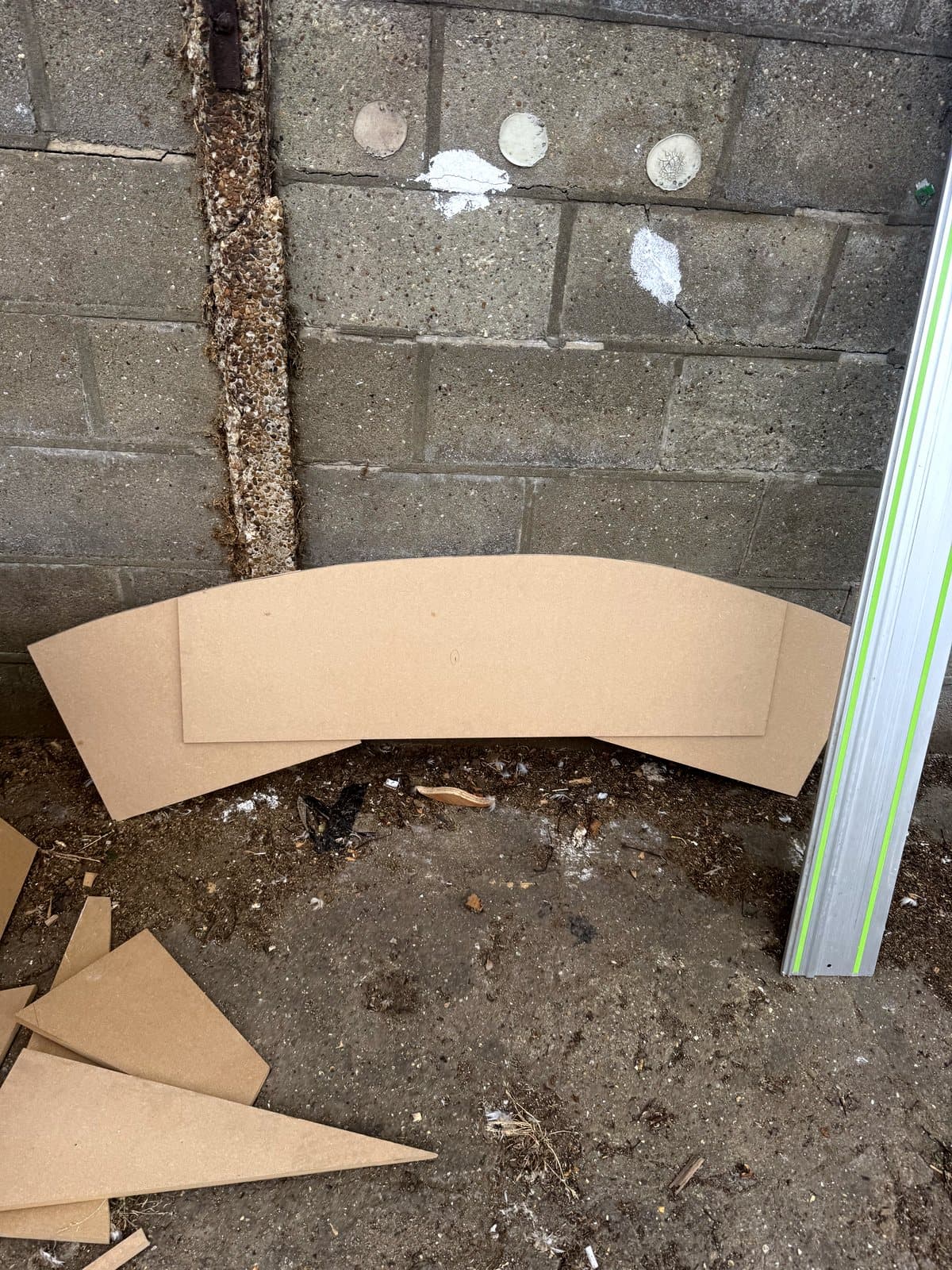 Curved piece cut from the board