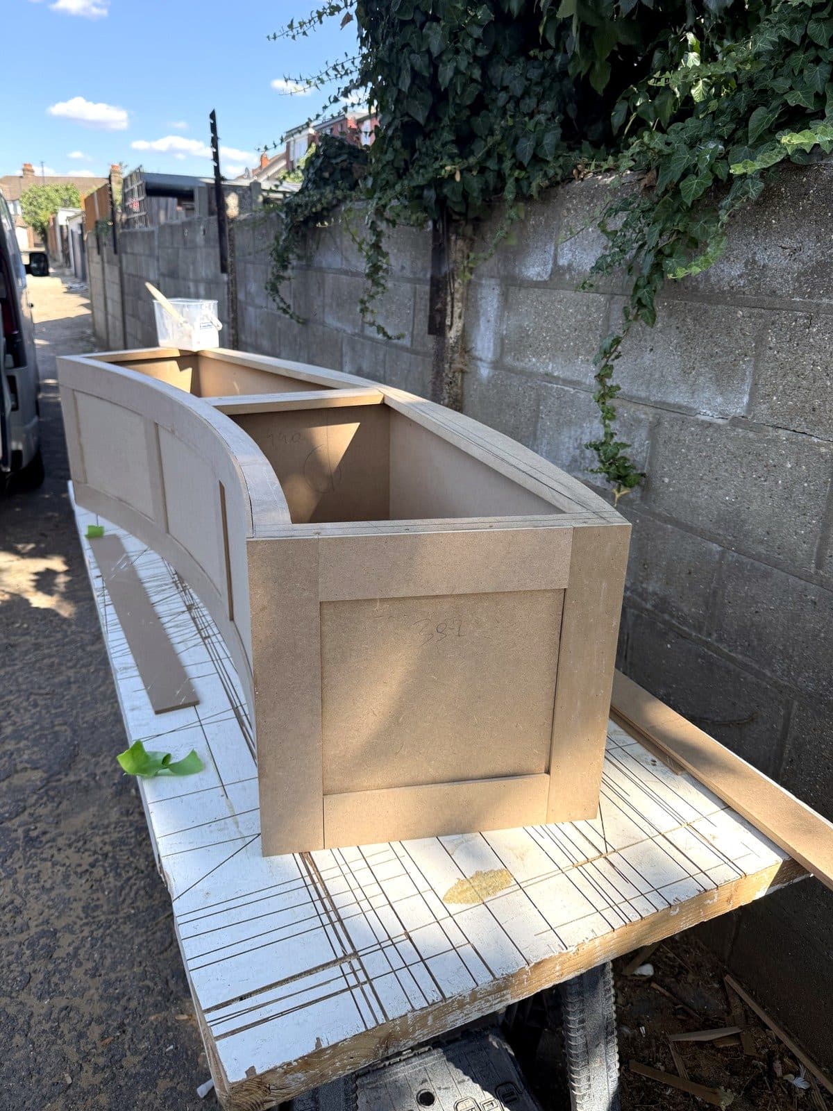 Panelled front on the curved bench
