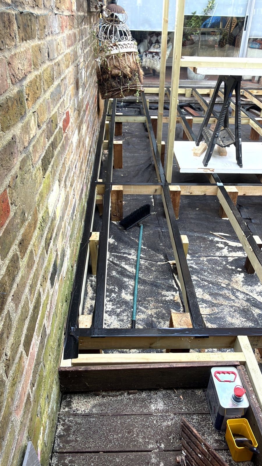 Trestles set up down the side of the house