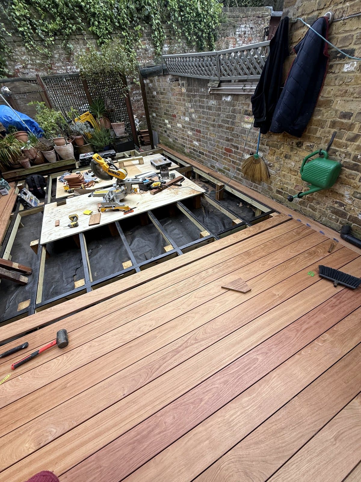 Boards going down, tools on the frame beyond