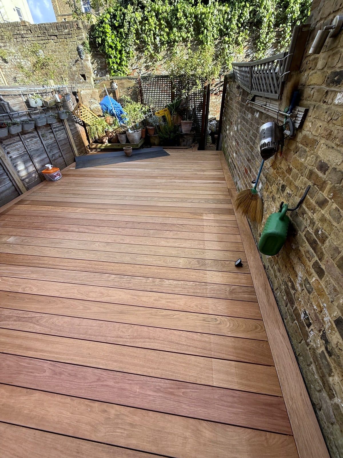 Deck along the brick wall