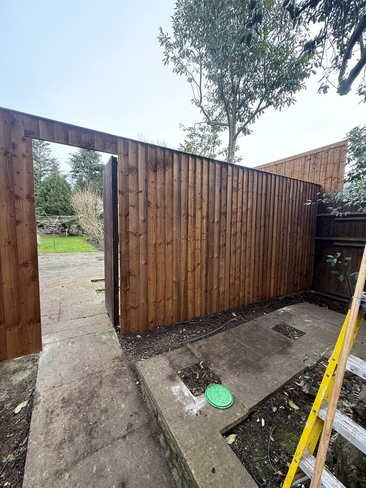 Fence along the side of the garden