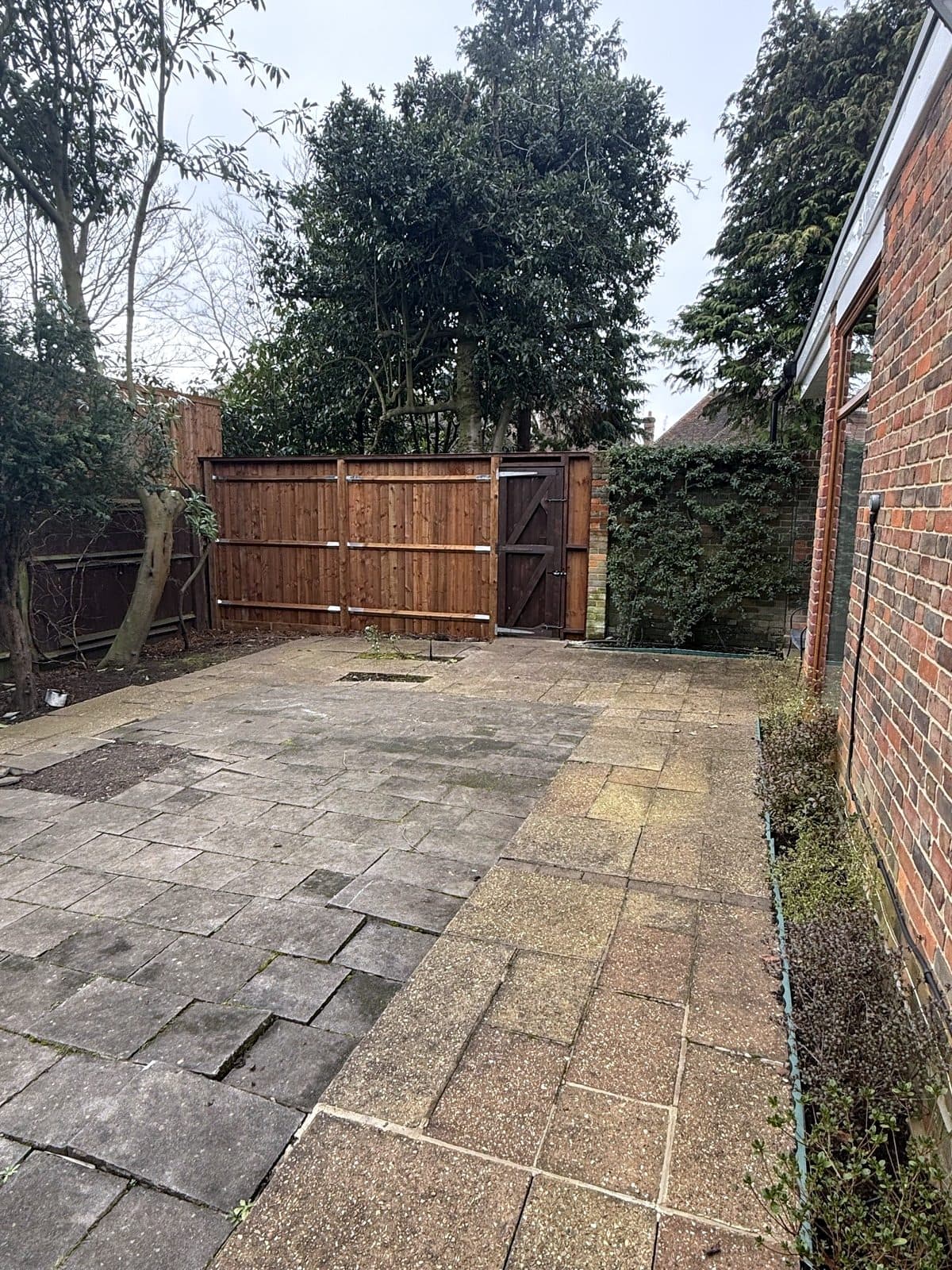 Fence and gate across the patio