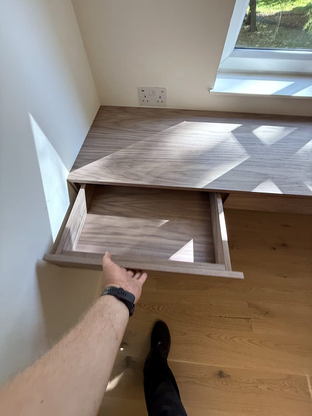 One drawer open, showing the walnut drawer box