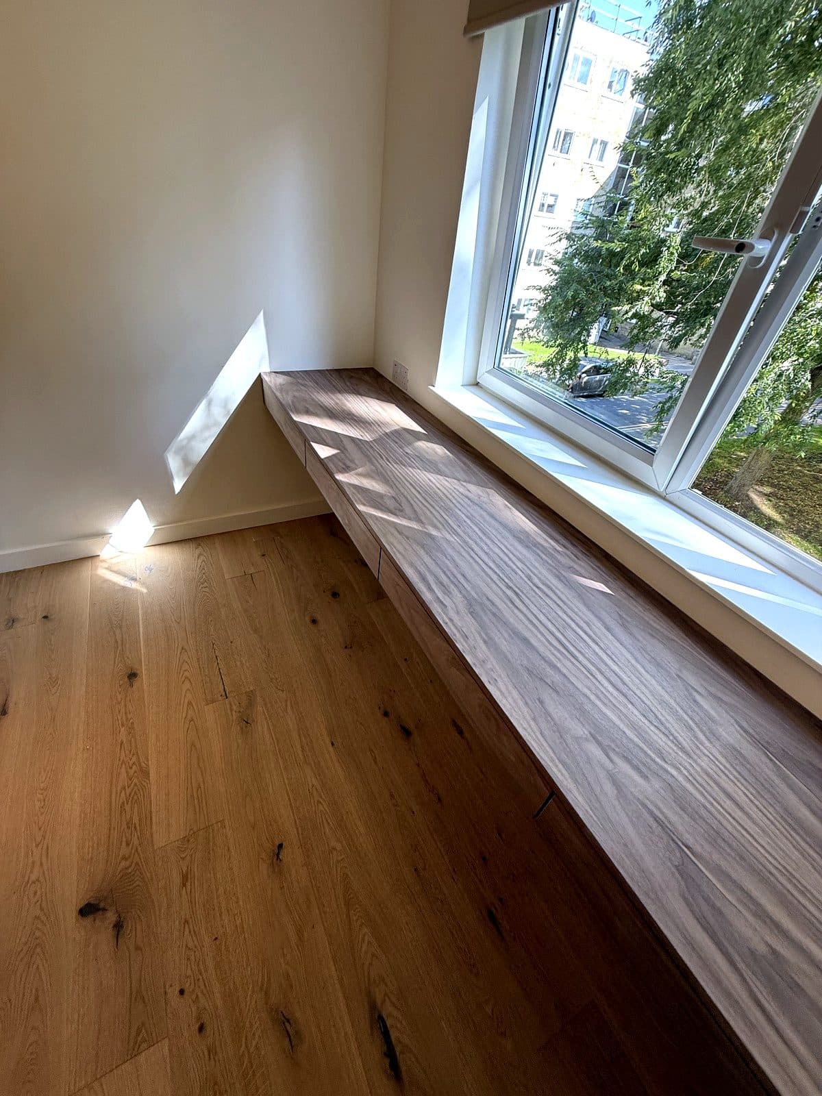 Looking along the desk top towards the window