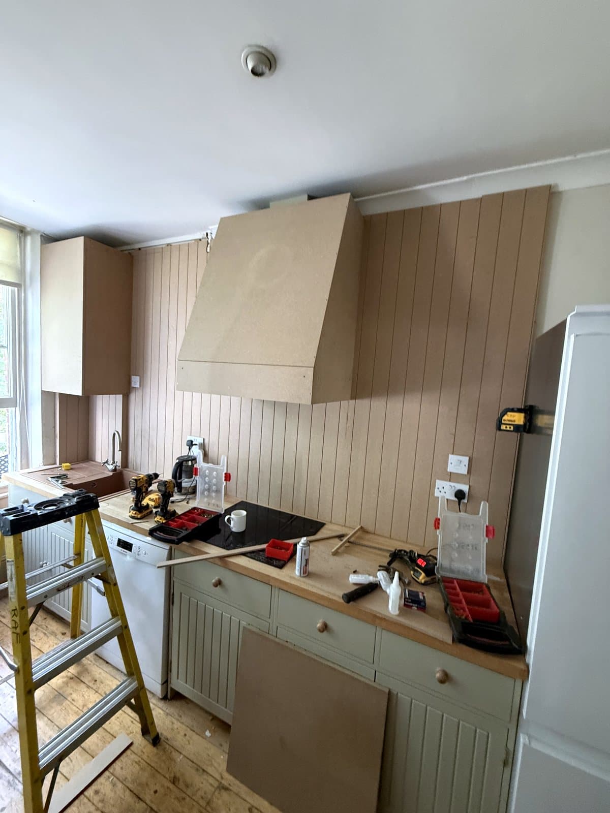 Hood boxed in, seen across the kitchen