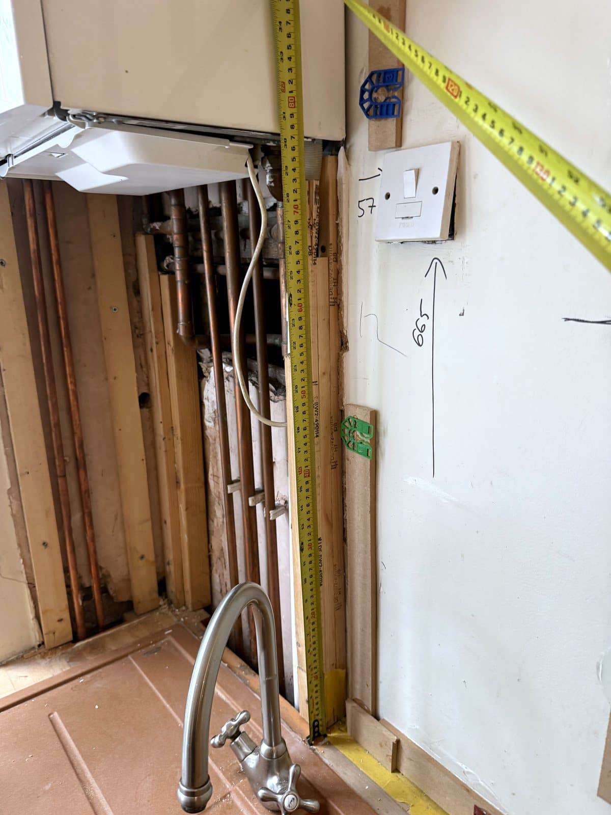 Measuring up beside the boiler