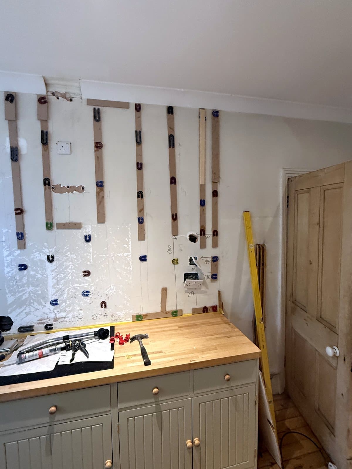 Battens along the wall above the worktop