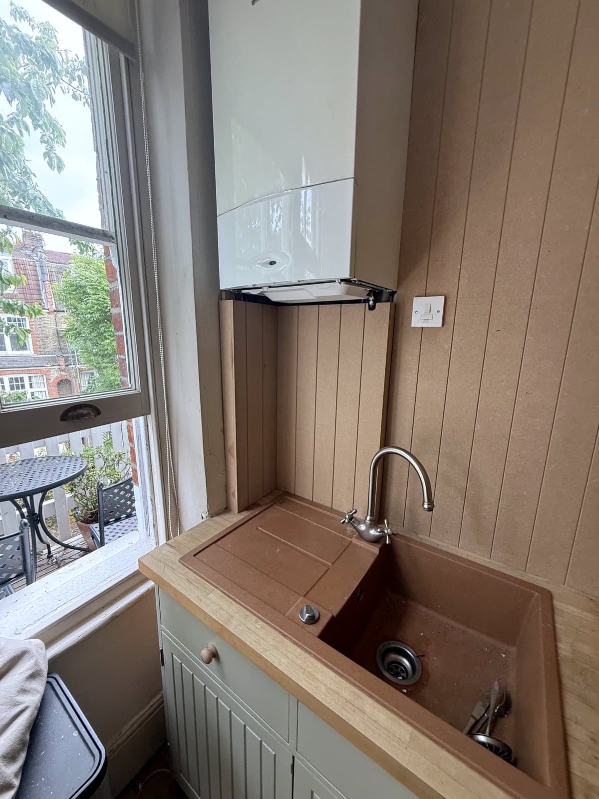 Panelling round the sink and window
