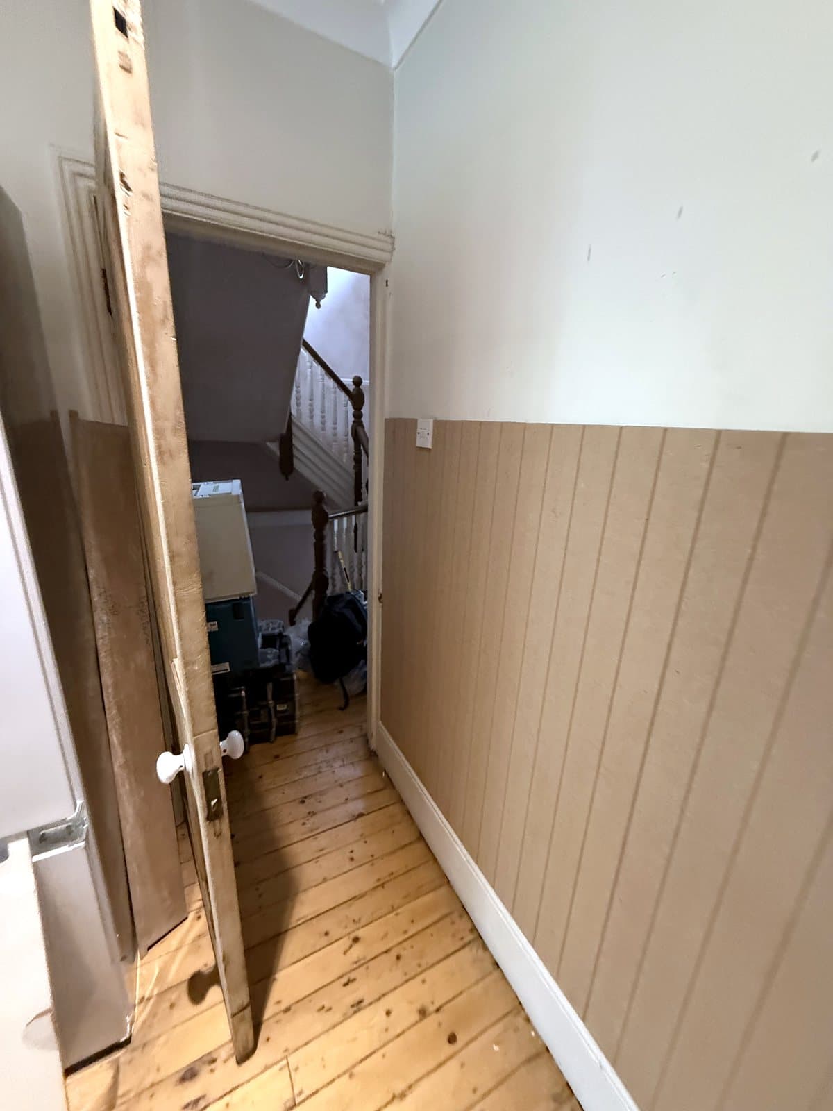 Panelling by the door to the hall