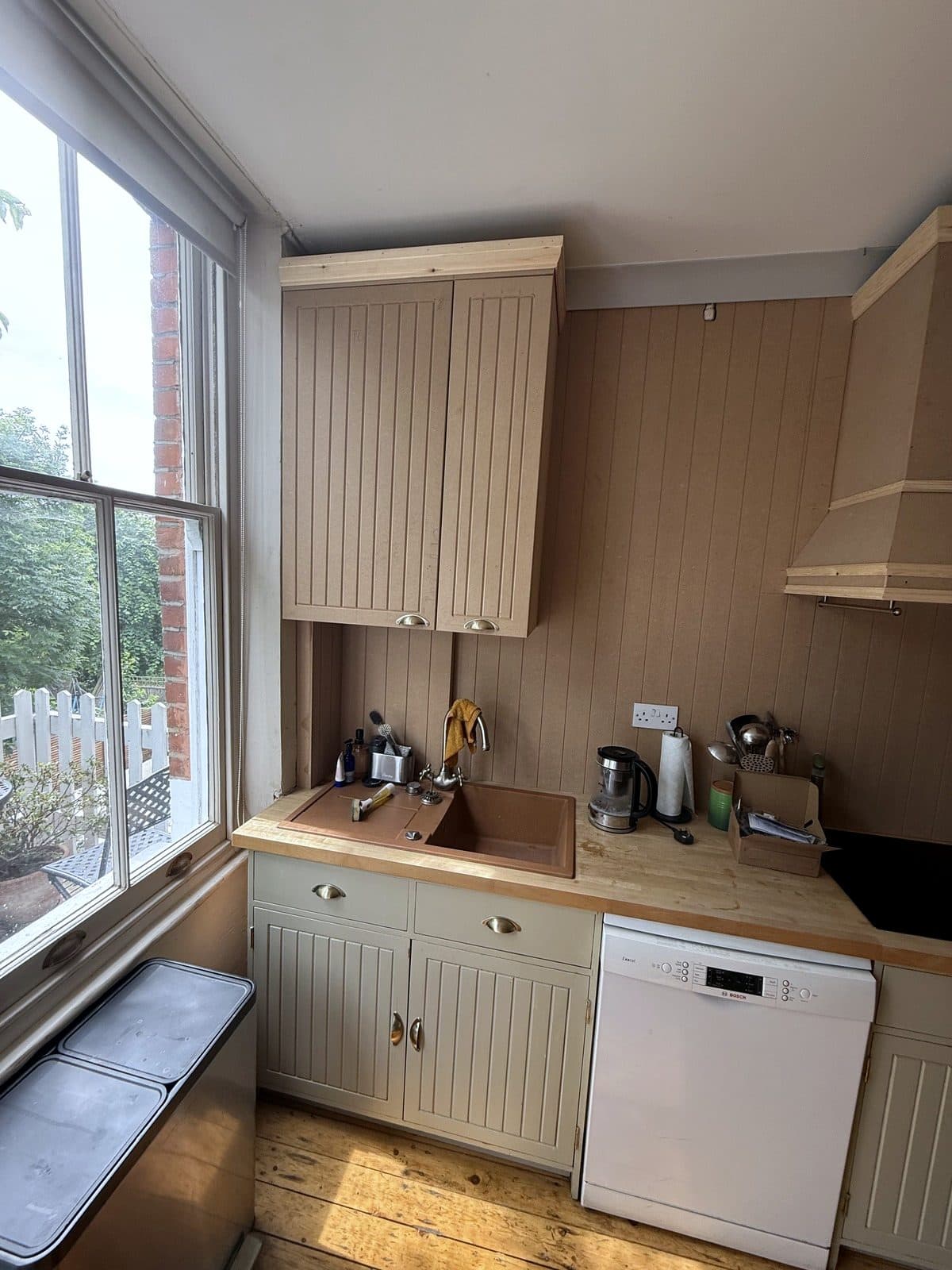 Panelled kitchen wall by the window