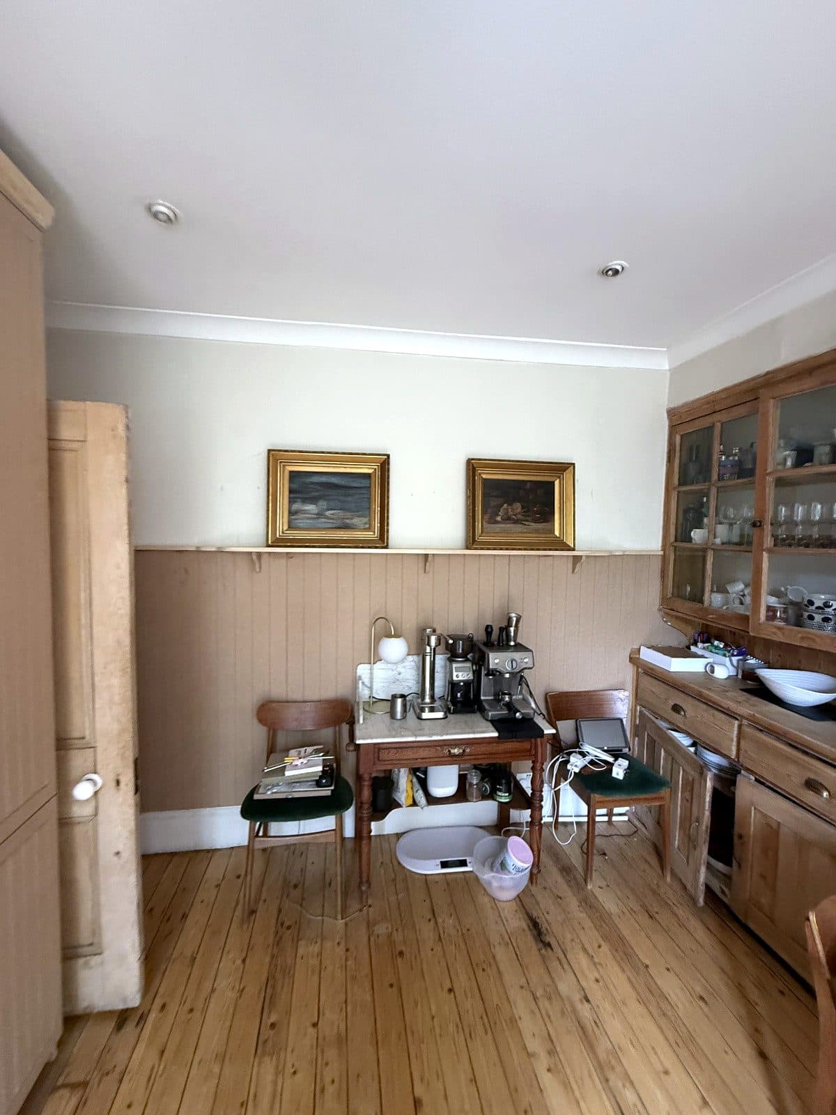 Dado-height panelling on the dining side
