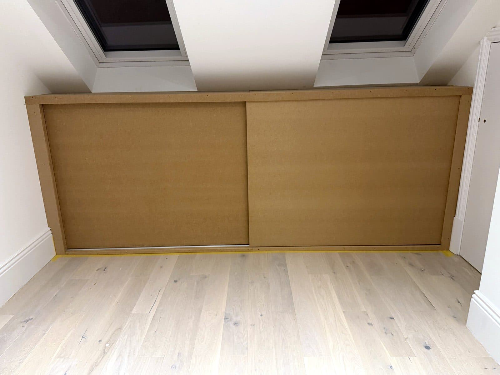 The storage seen across the loft floor