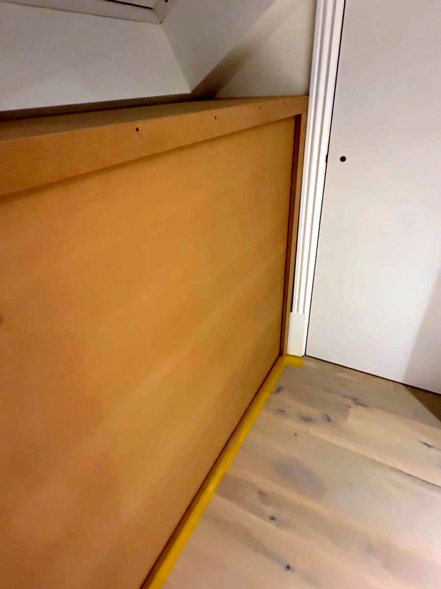 End of the storage run by the door