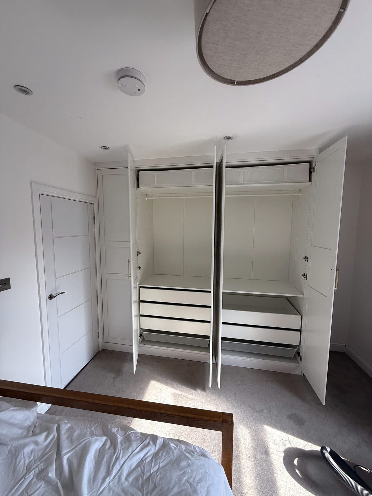 Doors open: hanging rails and drawers