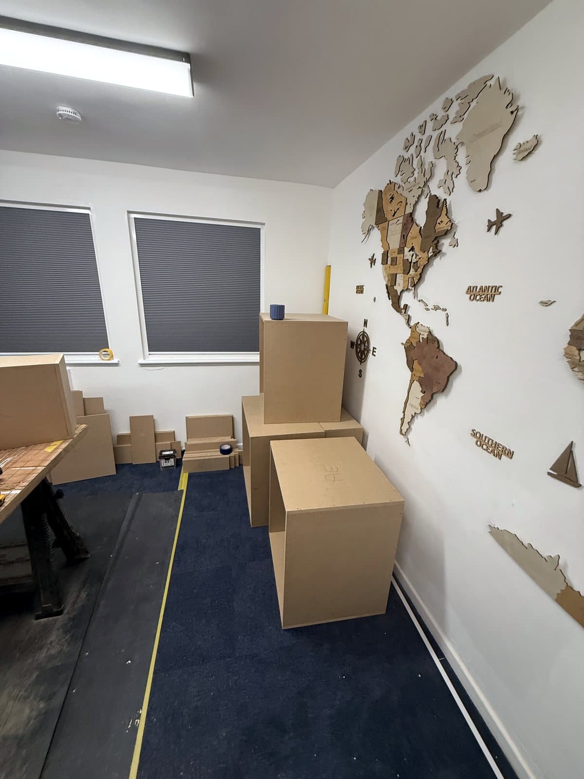 Room marked out in tape, first carcasses standing by the wall