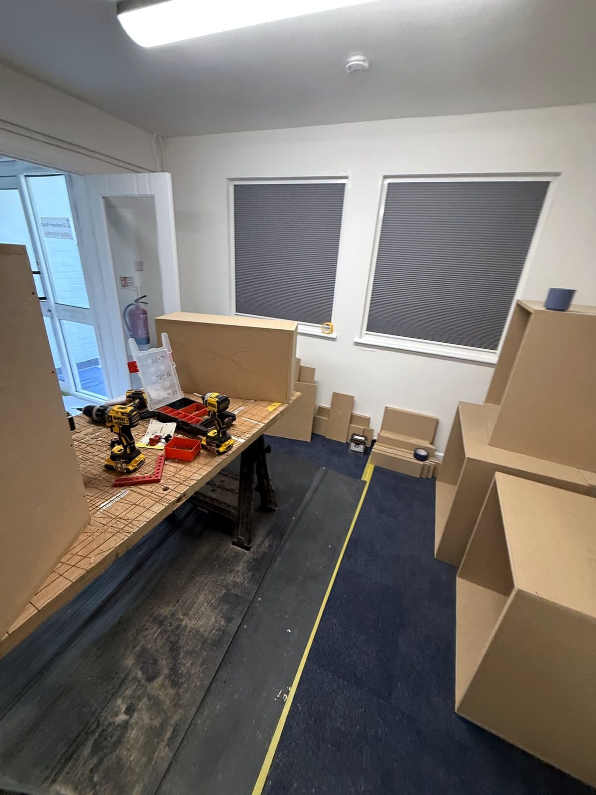 Workbench set up in the office with MDF parts around it