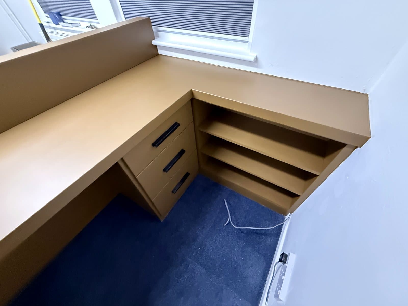Drawers and shelves on the staff side