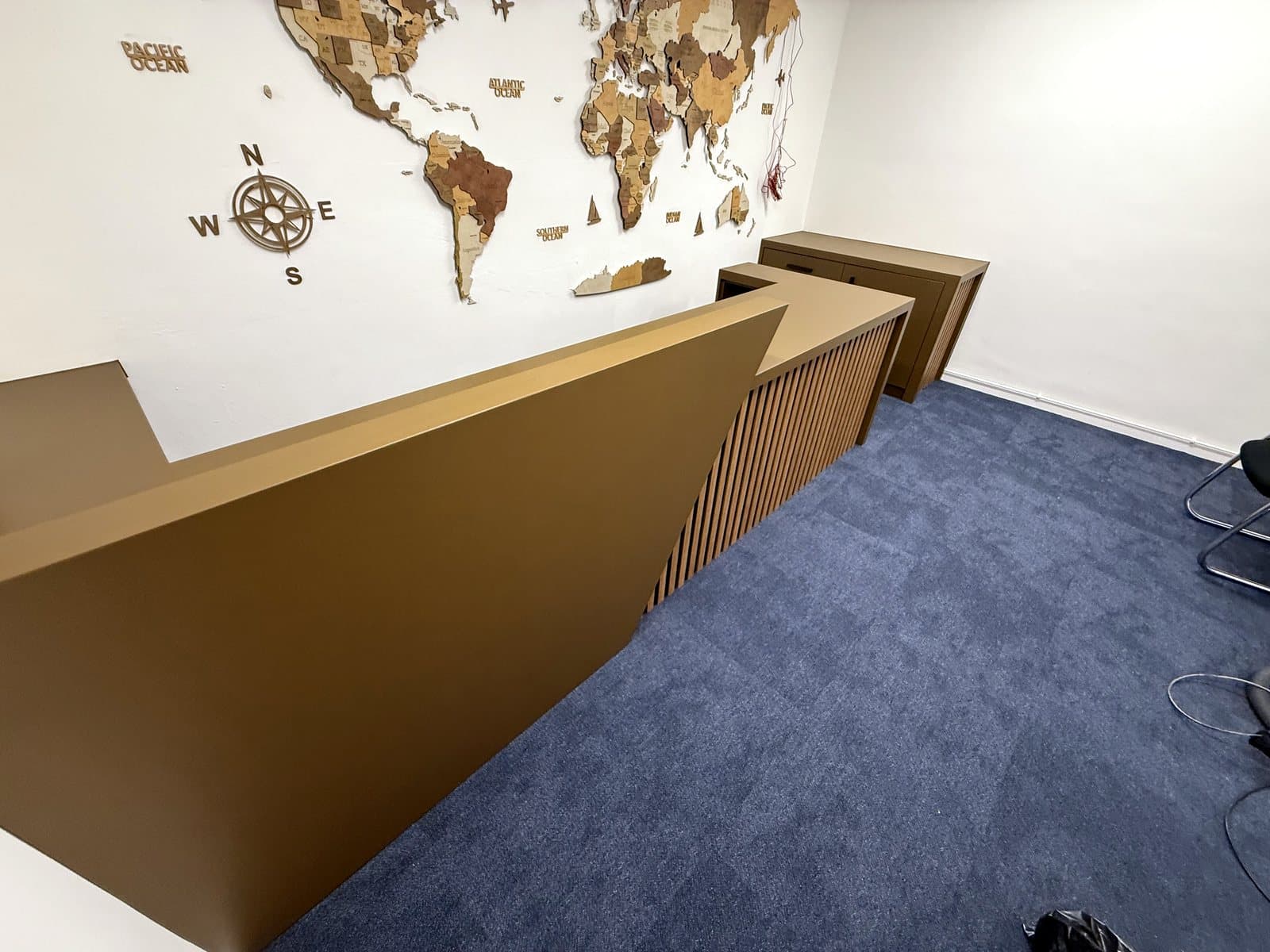 The angled end panel of the counter