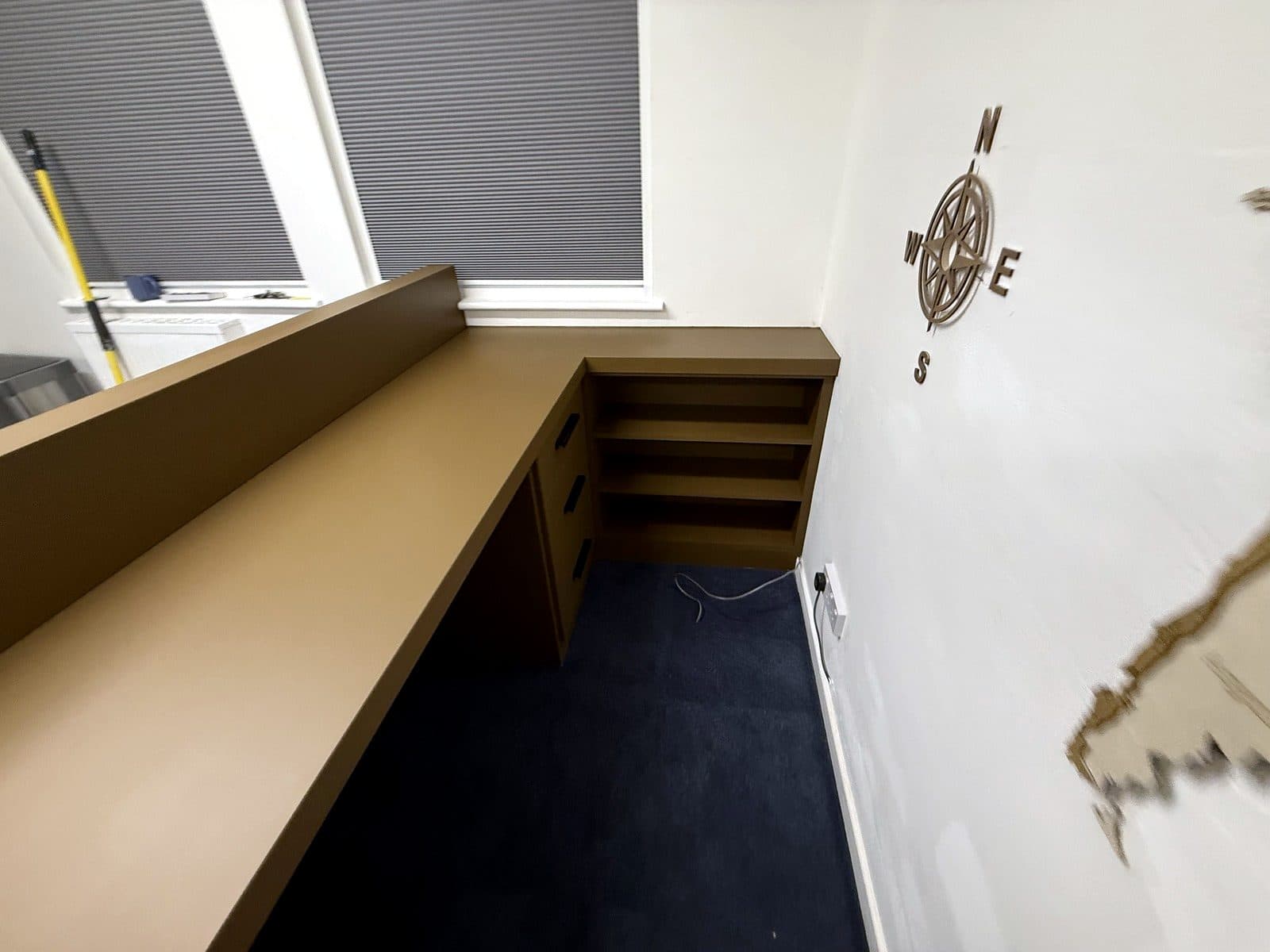 The desk top and the inside of the L