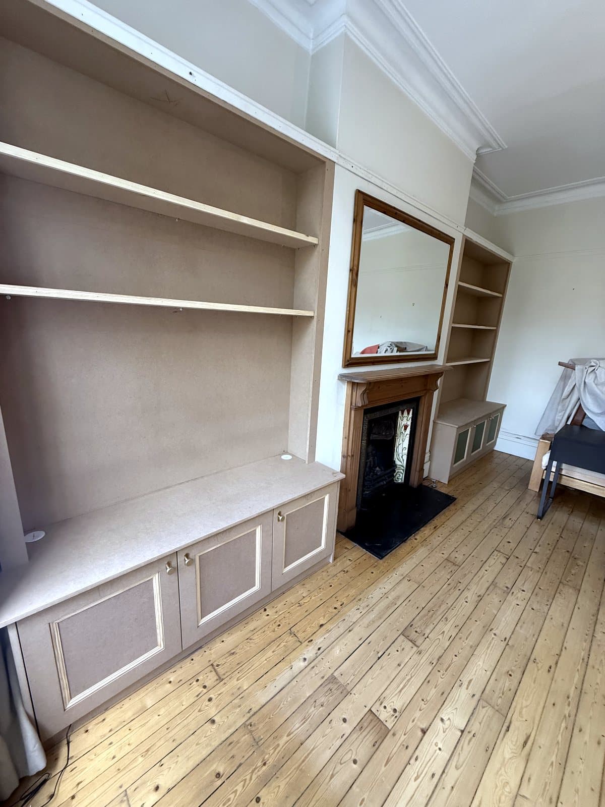 TV unit with the bookcase beyond