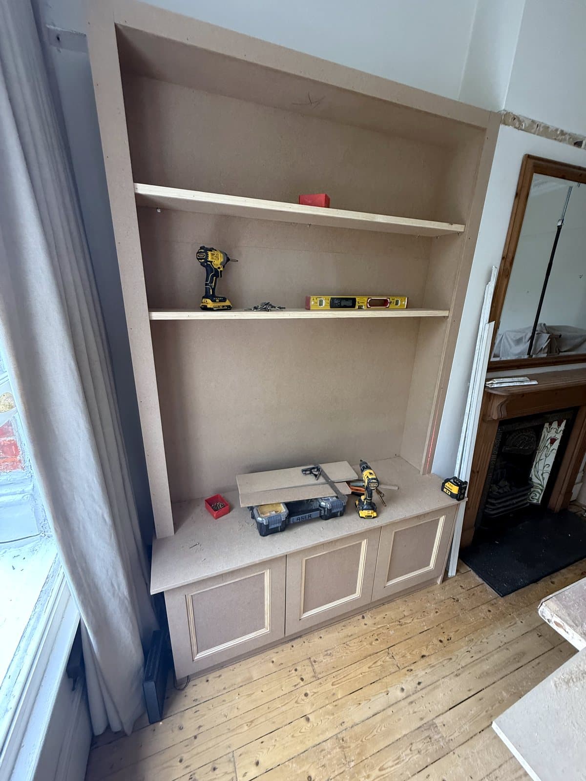 Shelves going in above the base