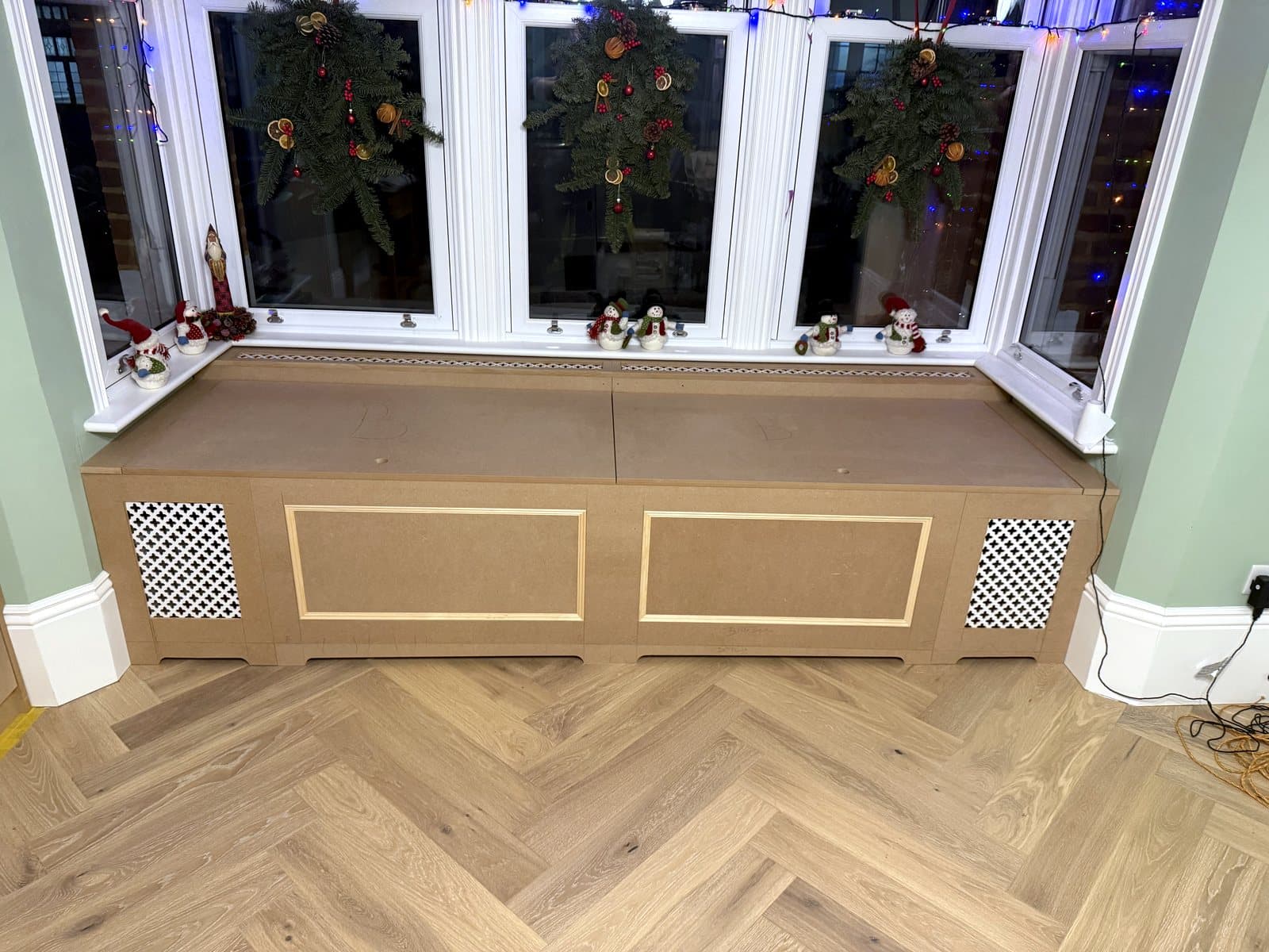 Window seat across the bay, grilles at each end