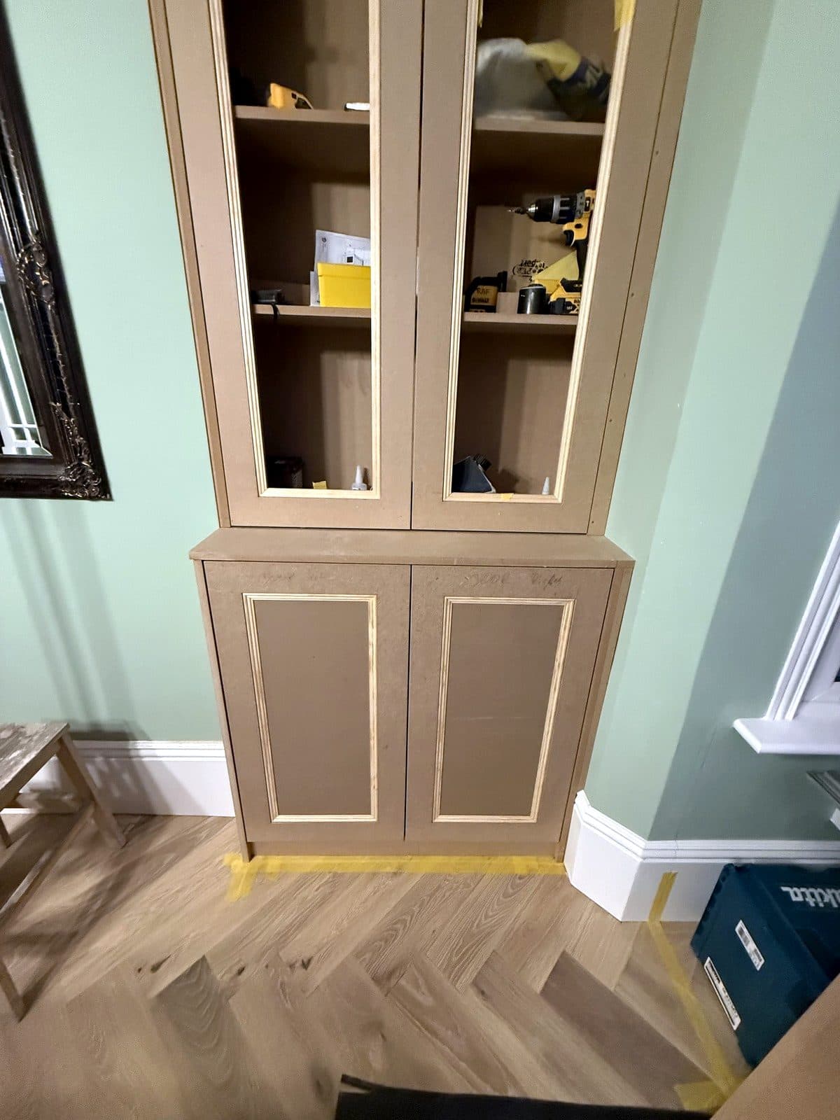 Alcove cabinet beside the chimney breast