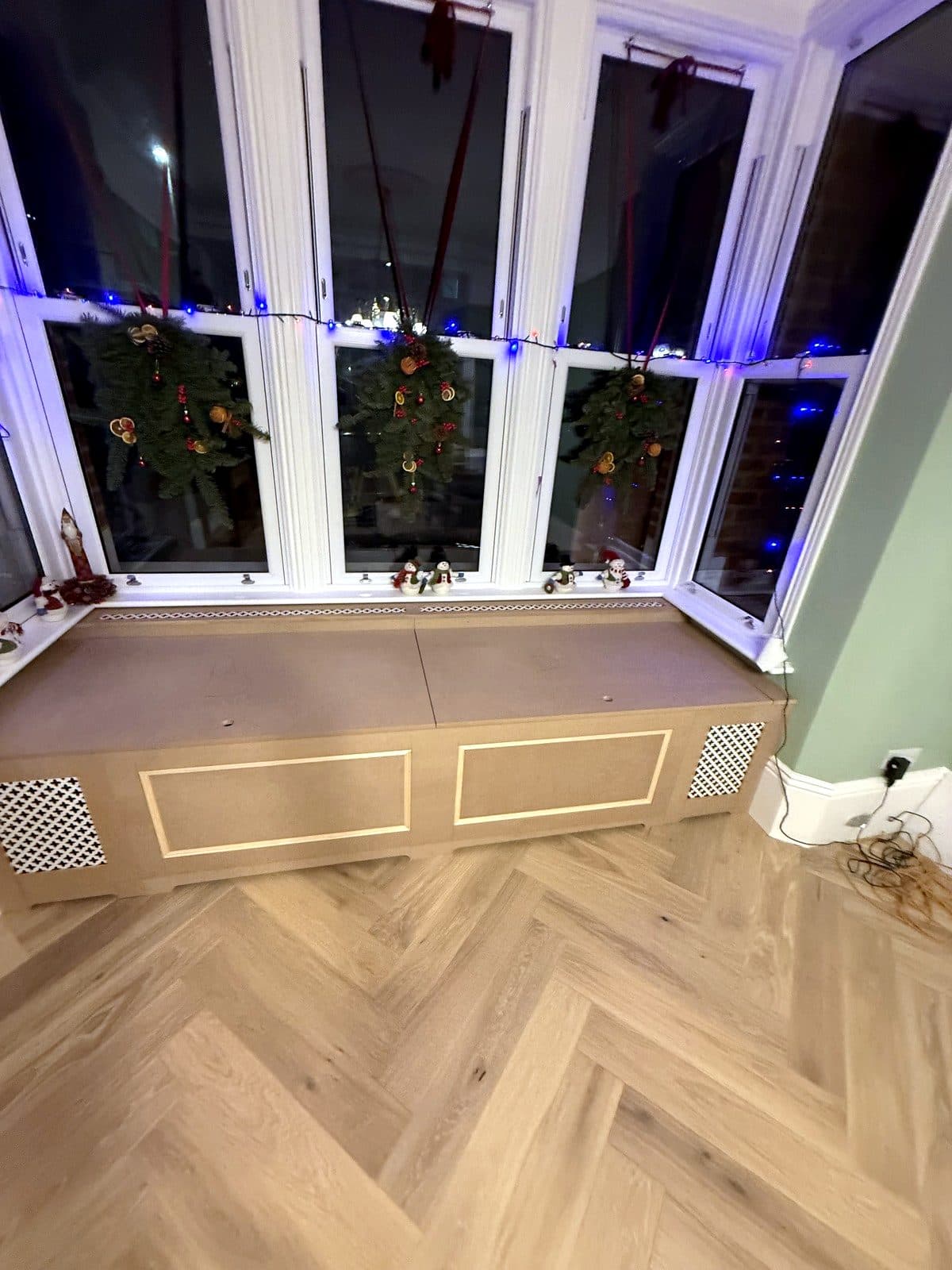 Window seat under the bay windows