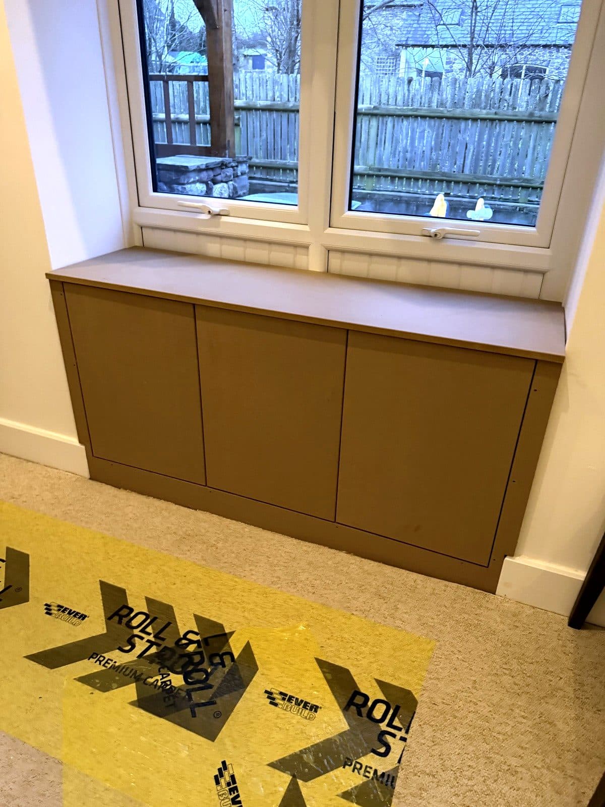 Window seat cupboards from the side