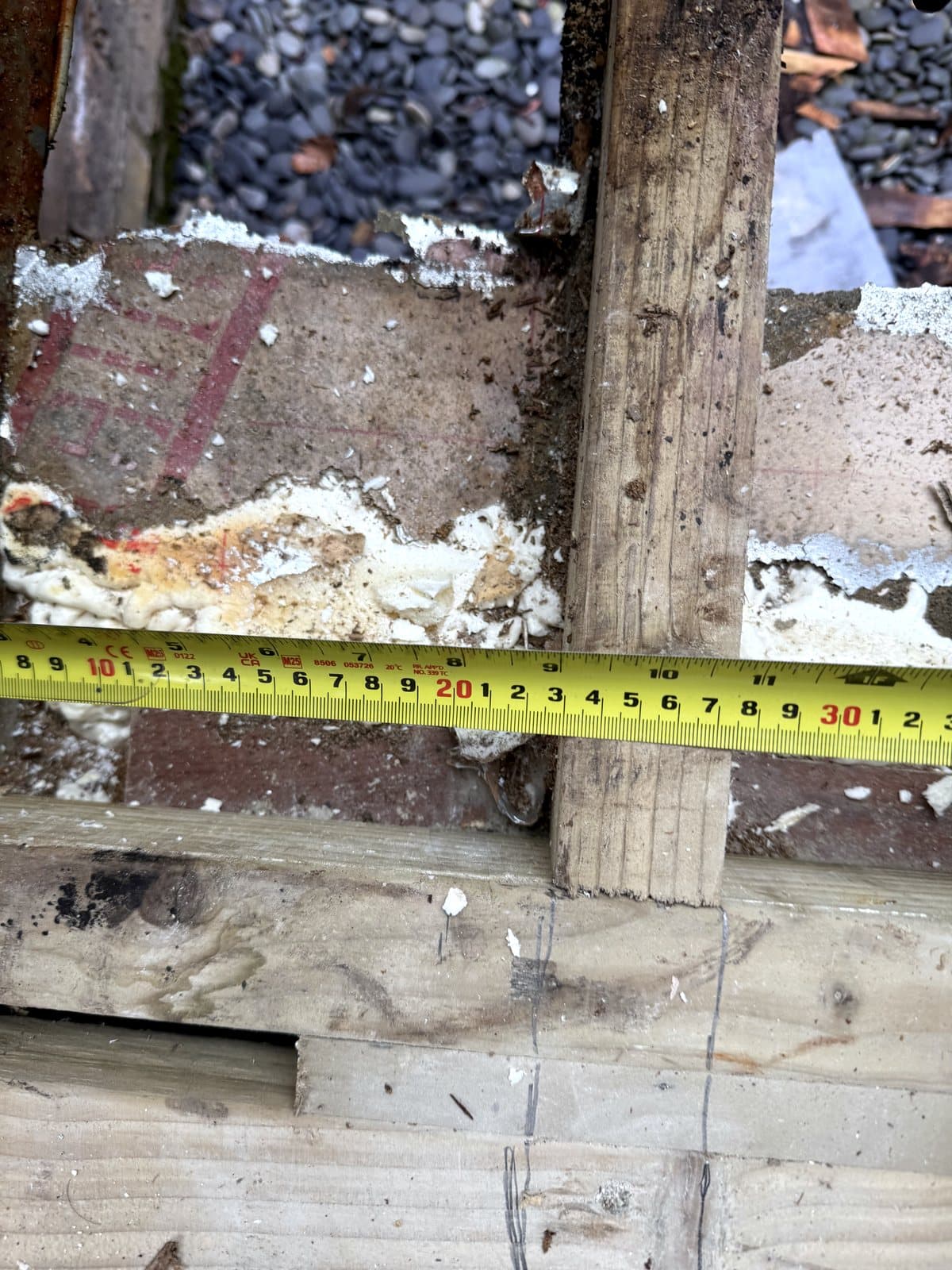 Measuring between the old timbers