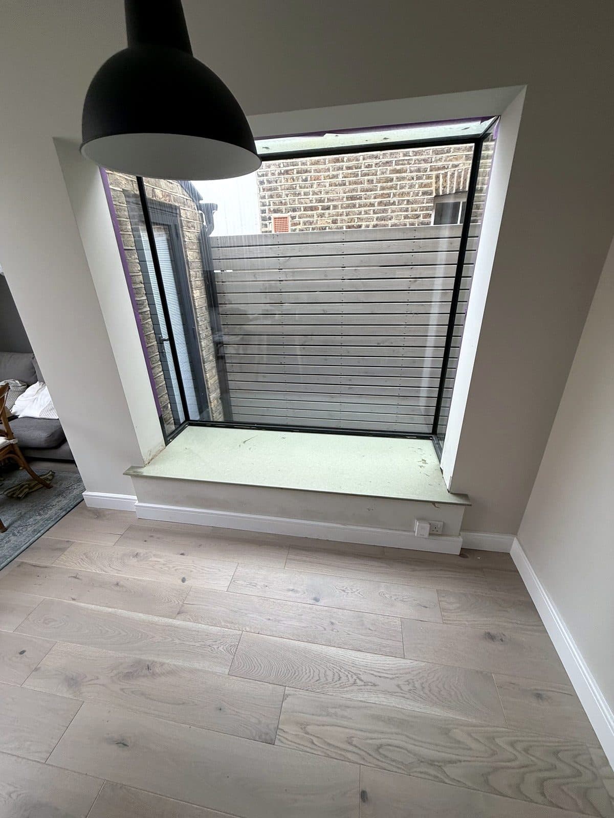 The new seat in the glass box window
