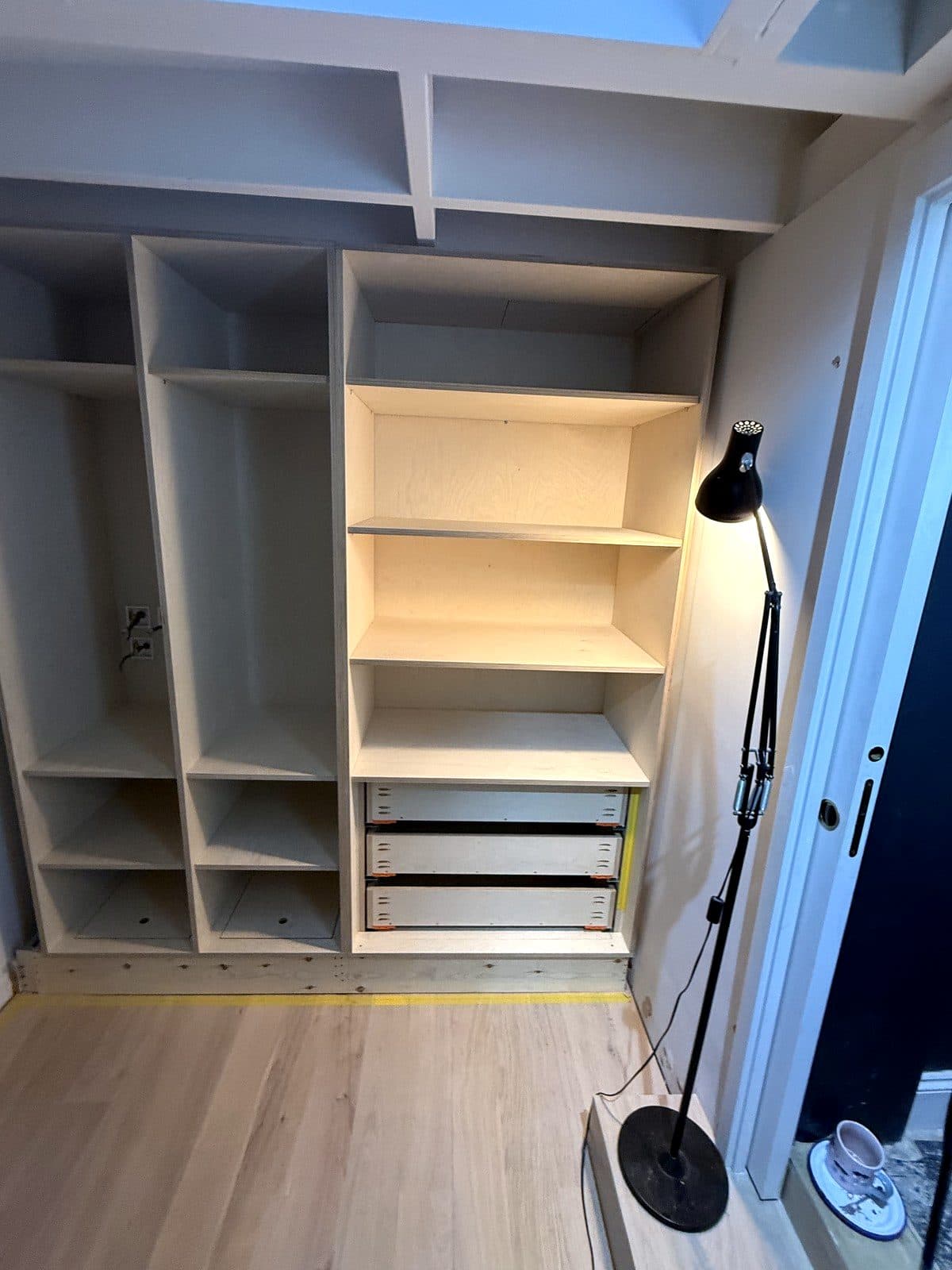 The wardrobe interior finished, ready for the doors