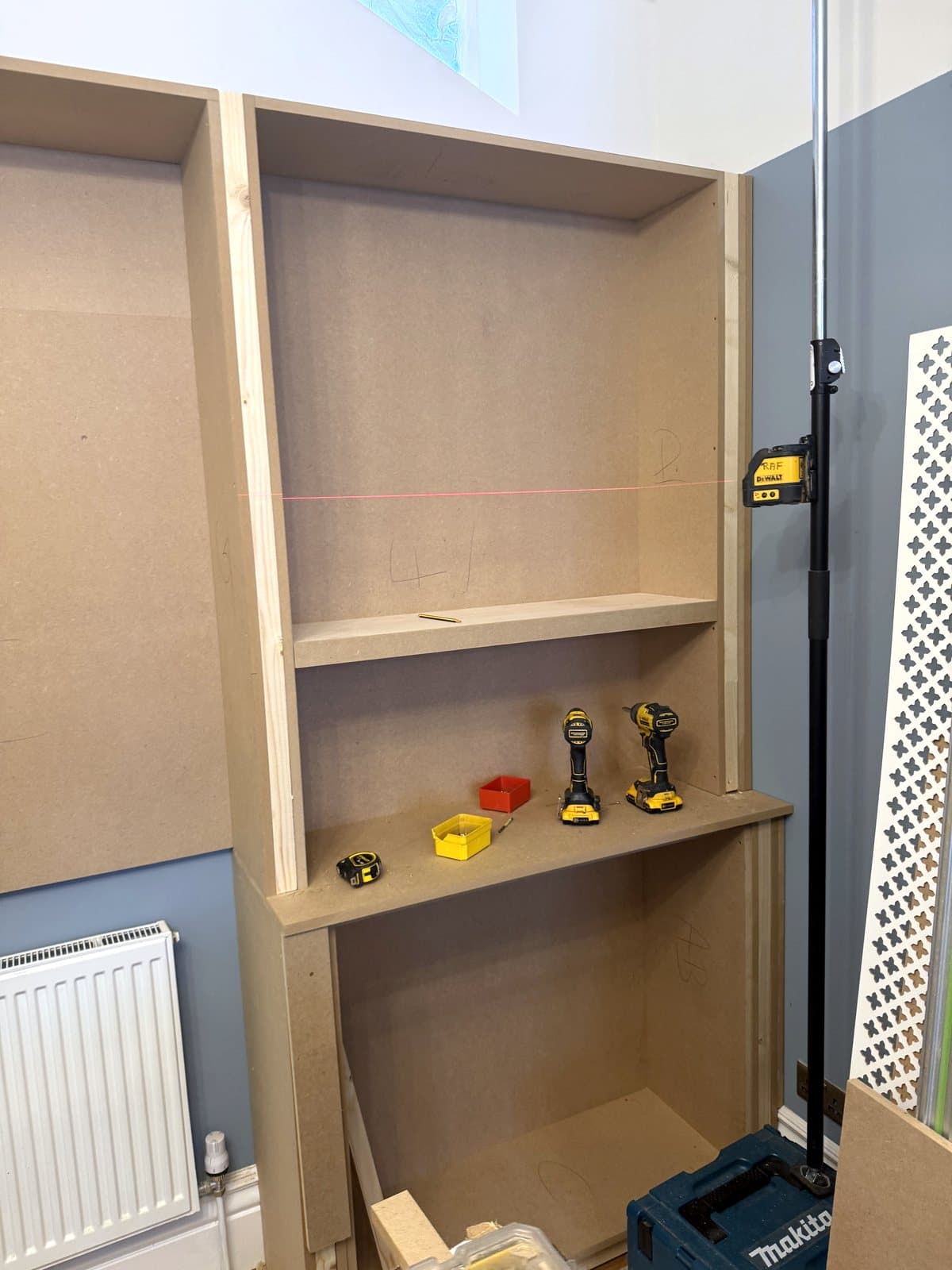 Laser line across the back of a bay