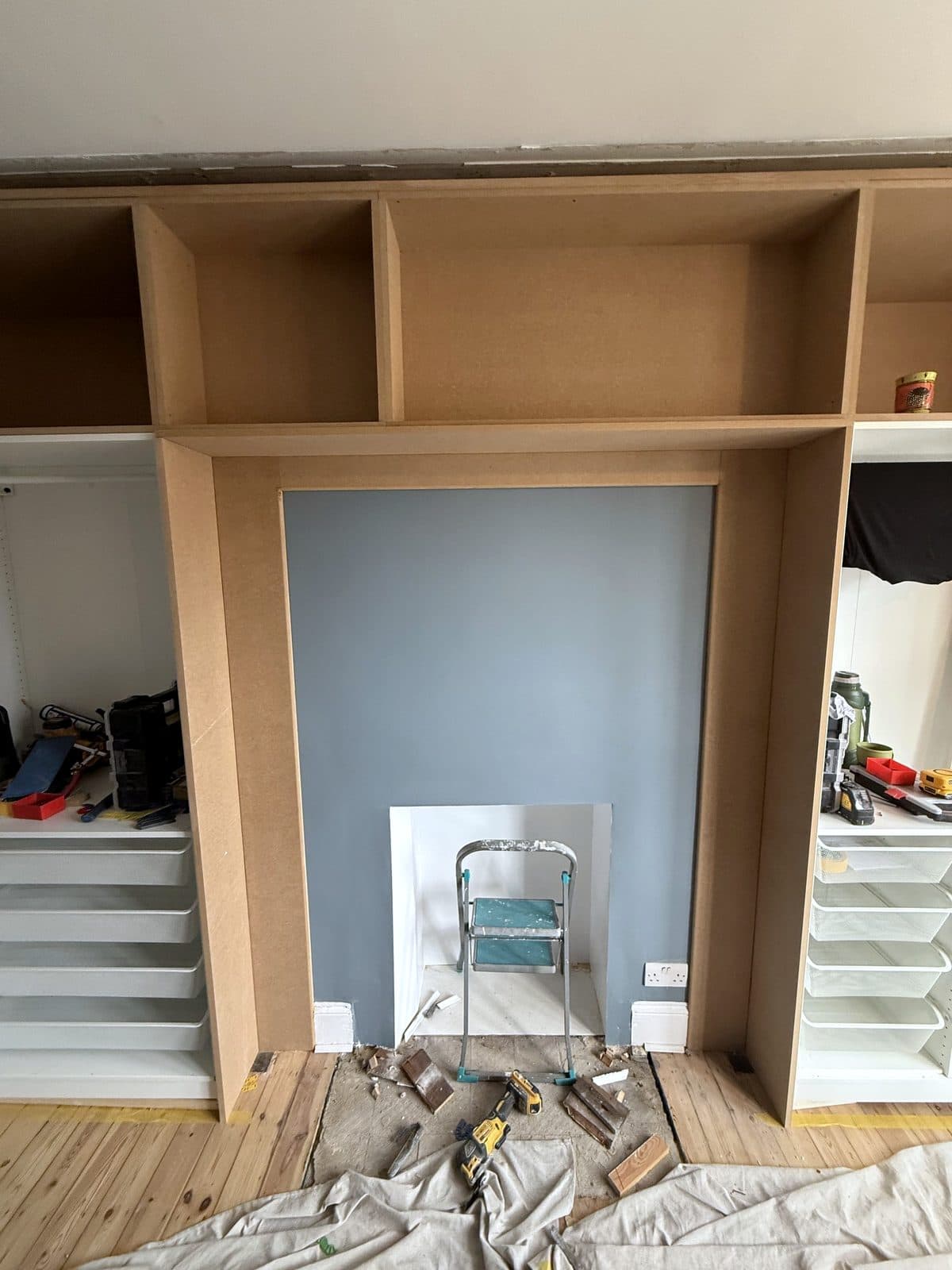 MDF face frames and open top boxes across the whole wall