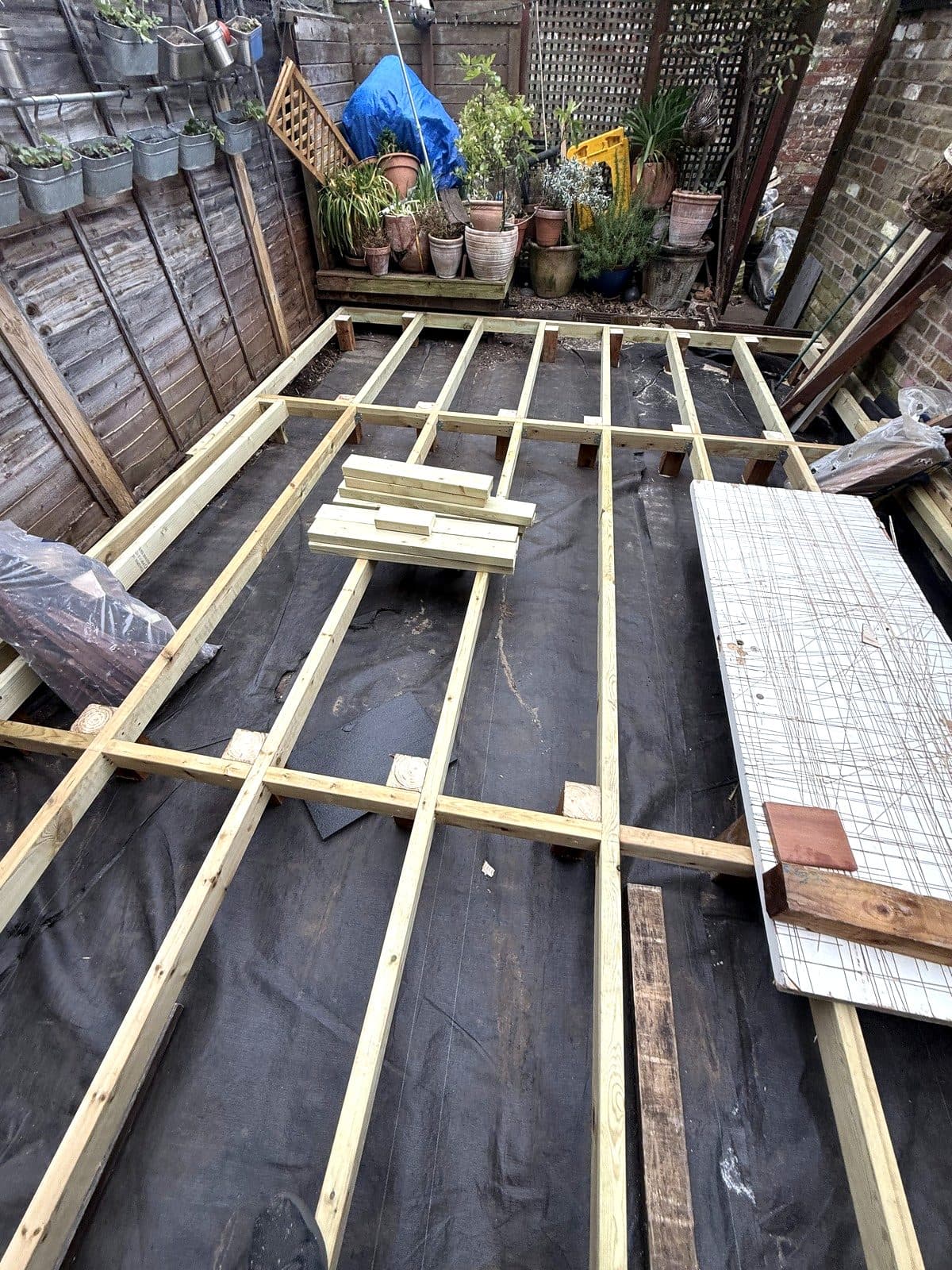 Timber frame laid across the garden