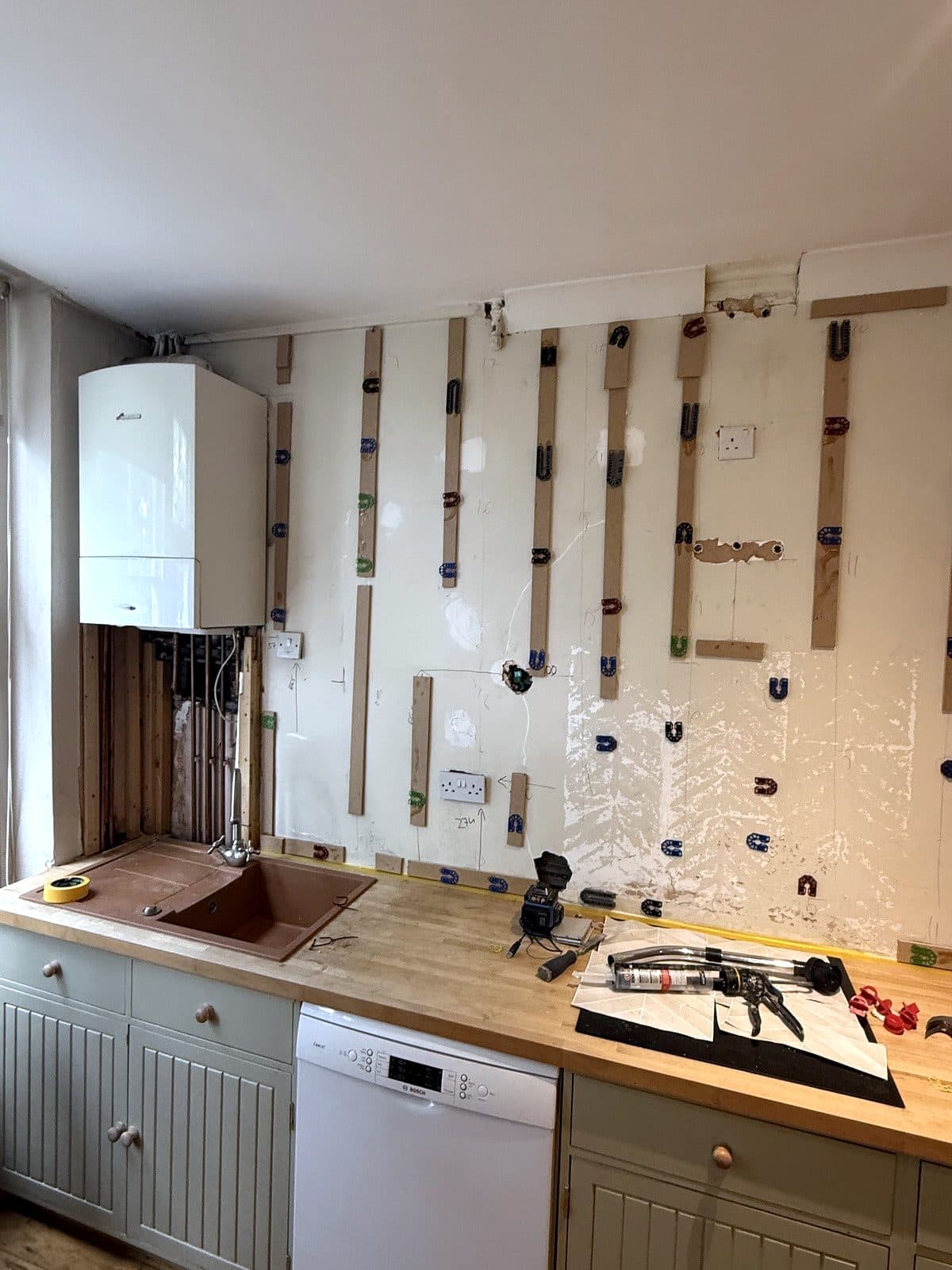 Battens fixed to the kitchen wall