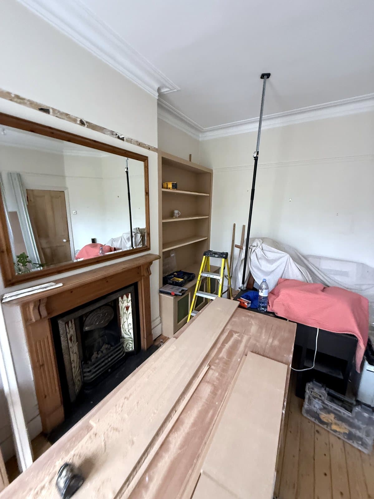 MDF boards on trestles in the middle of the living room