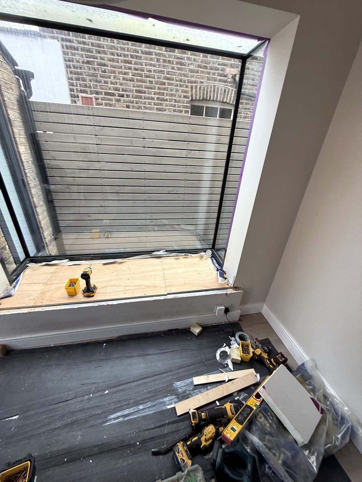 Boarded base in the window
