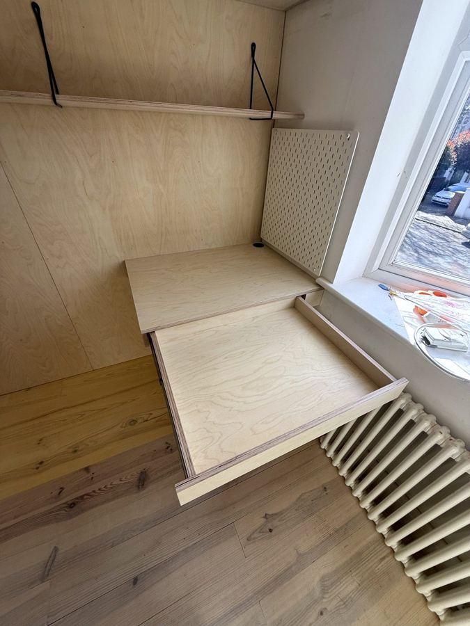 The desk drawer pulled out