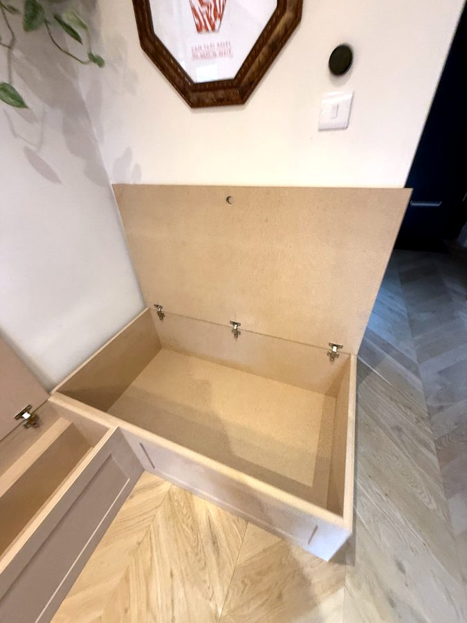 The corner lid up, with the deep box underneath
