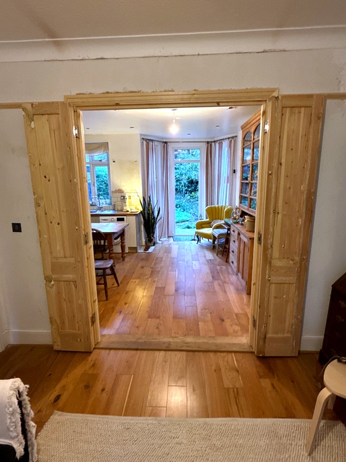 Folded back at each side of the opening
