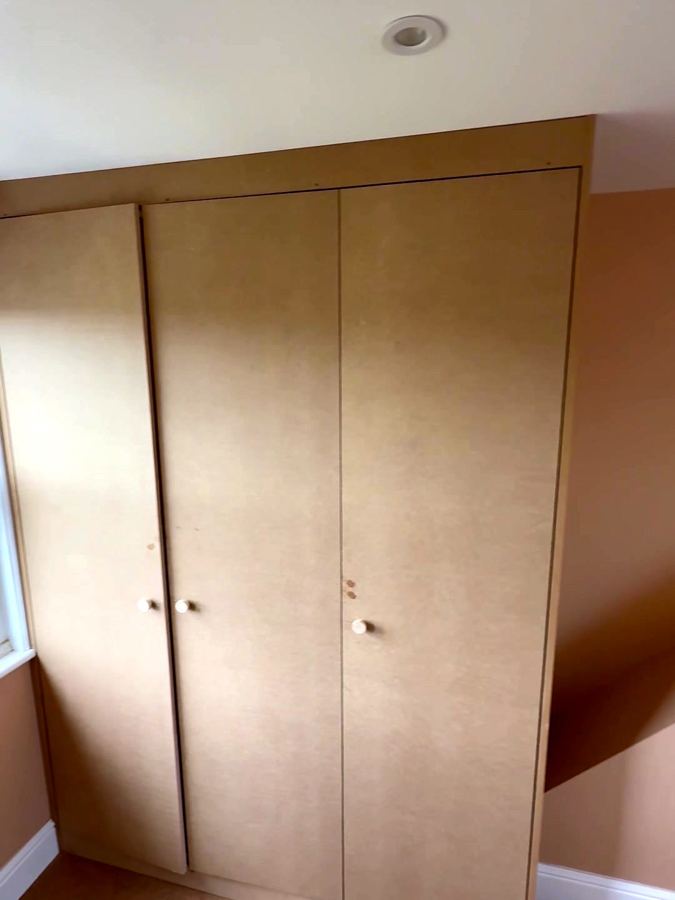 Three doors closed, up to the ceiling