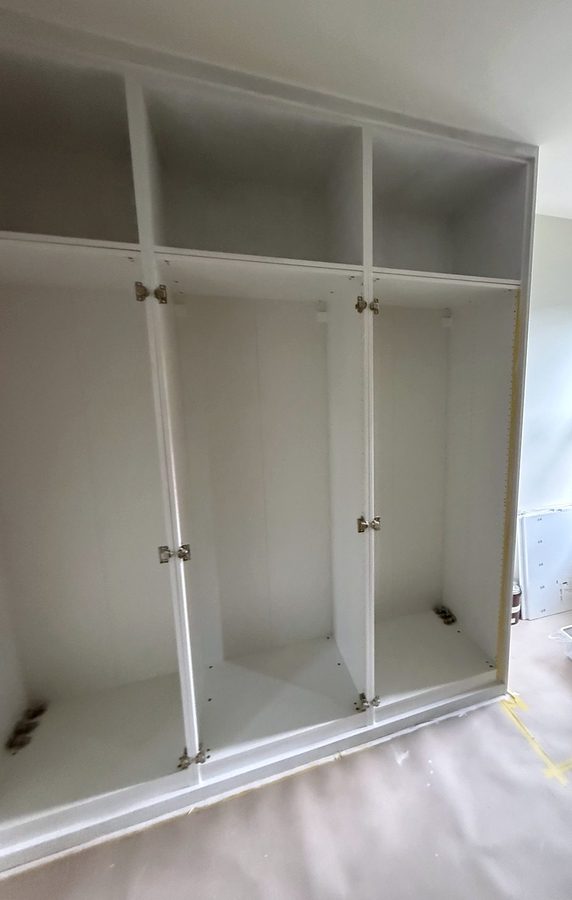 Frames and boxes painted, hinge plates on, waiting for doors