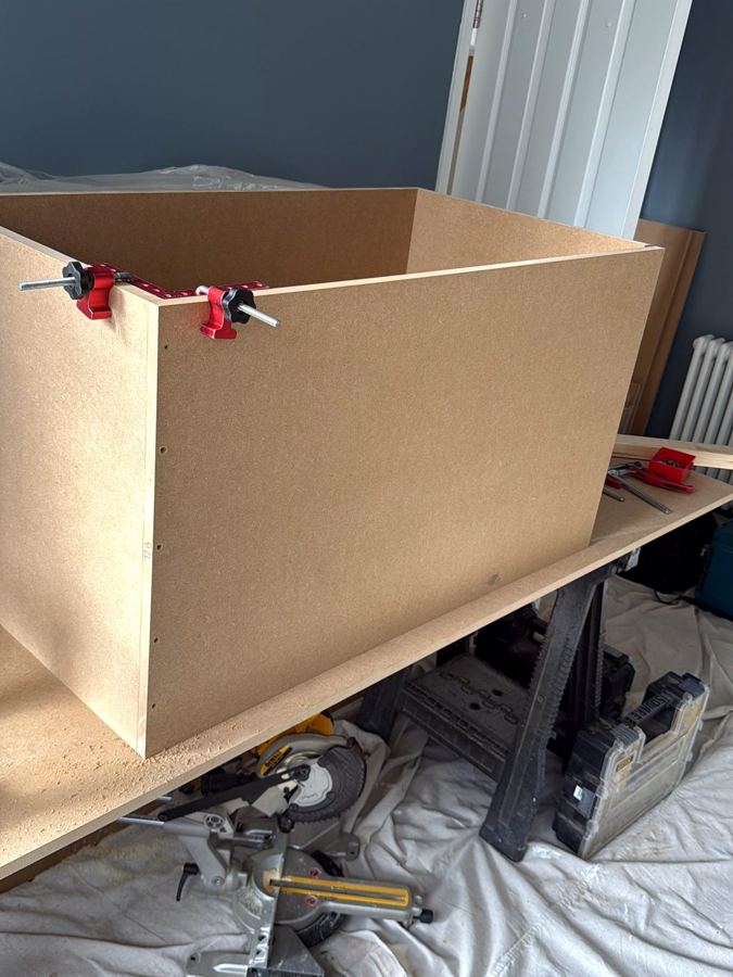 Overhead boxes glued and clamped on the bench