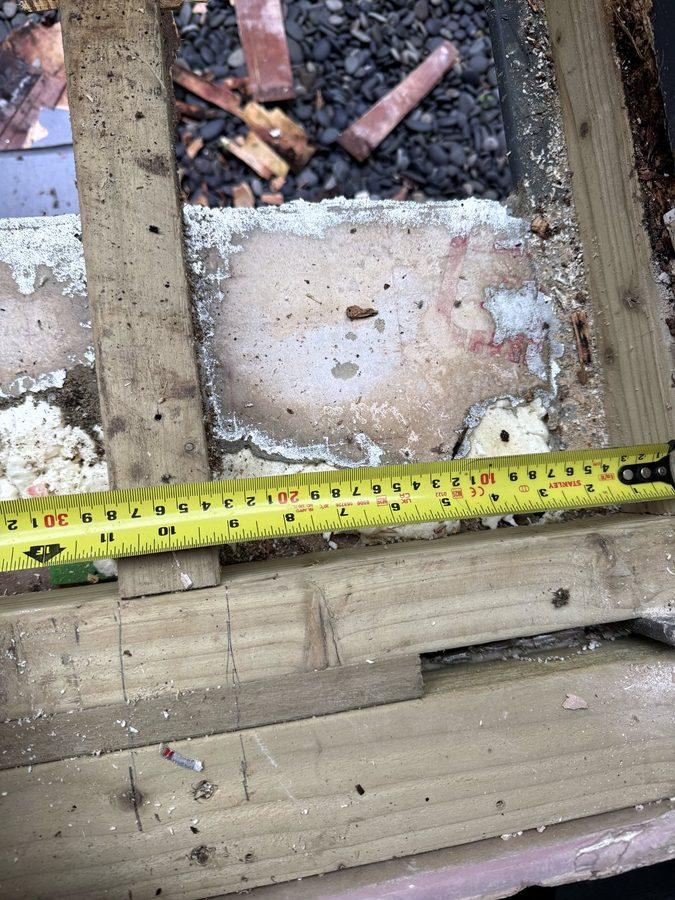 Tape measure across the old timbers